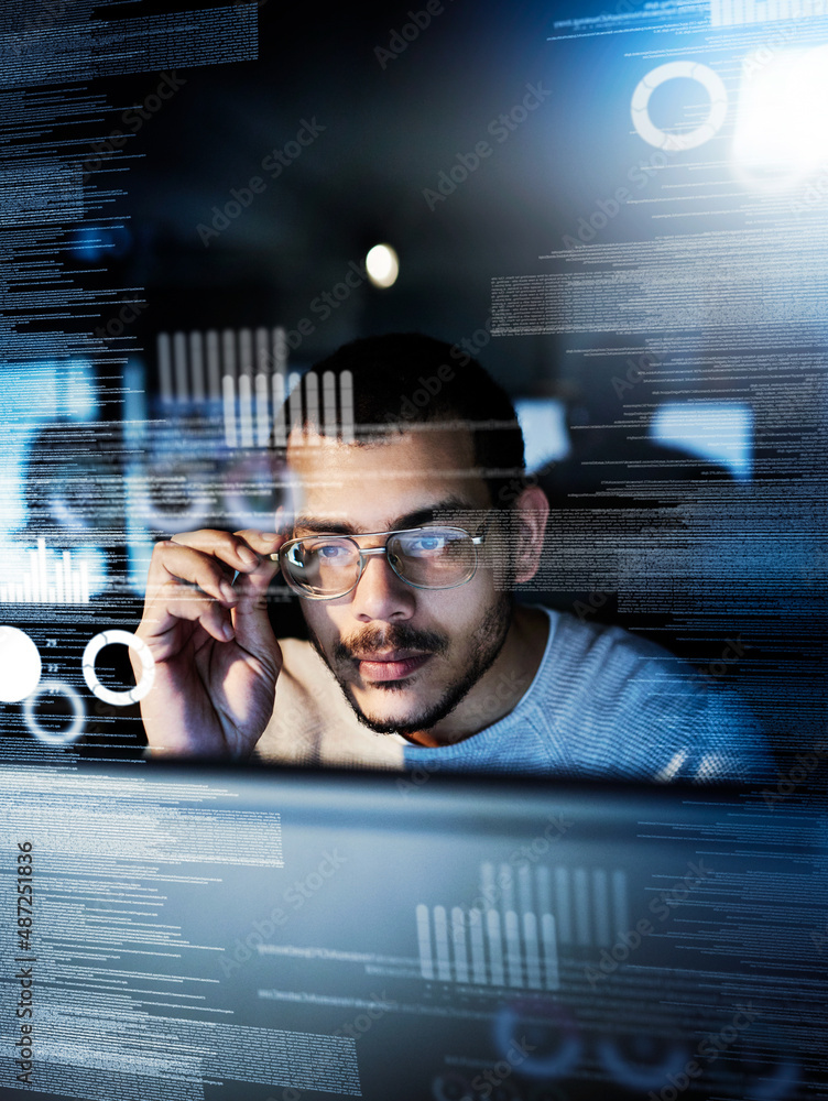 Testing his code. Cropped shot of a male computer programmer working on new code.