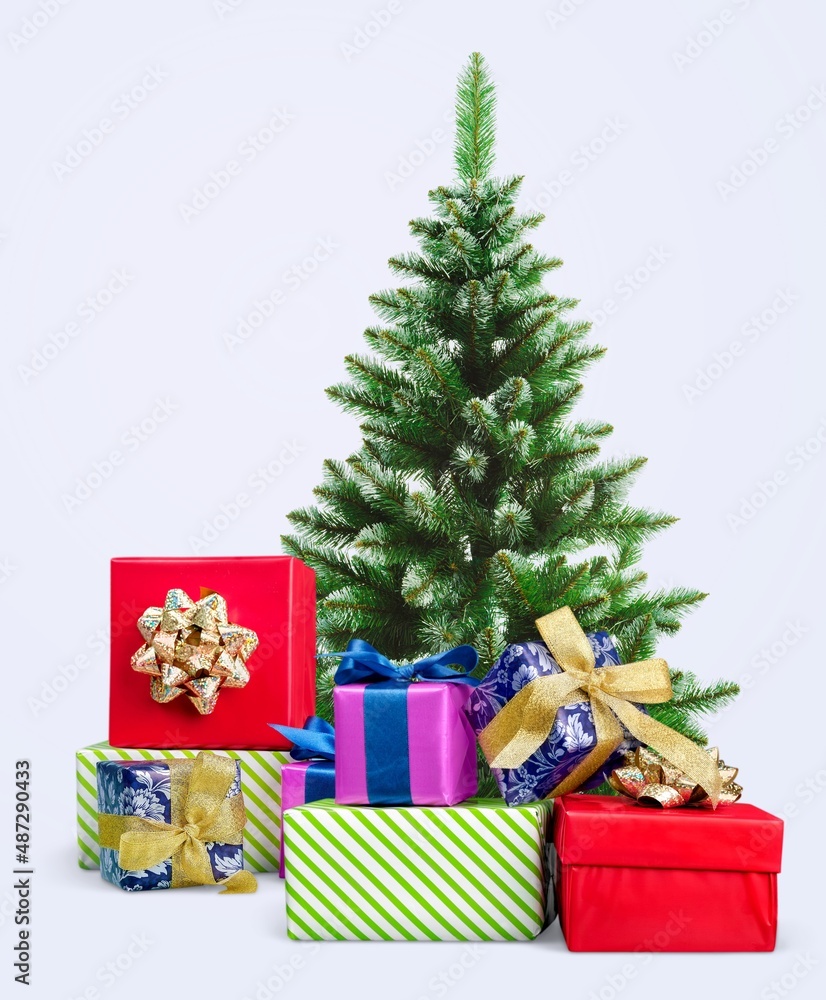 Christmas and new year concept with tree and gifts