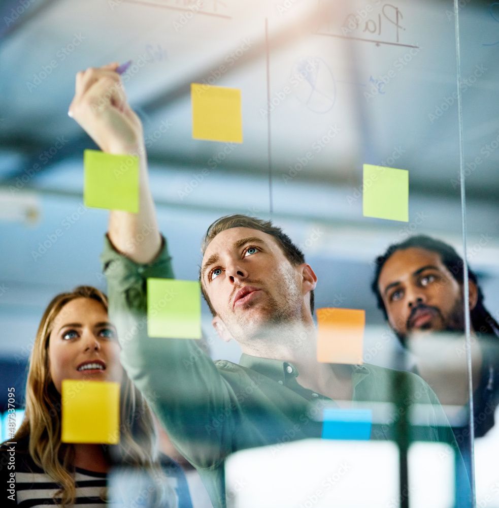 Combining knowledge for the good of business. Shot of colleagues having a brainstorming session with