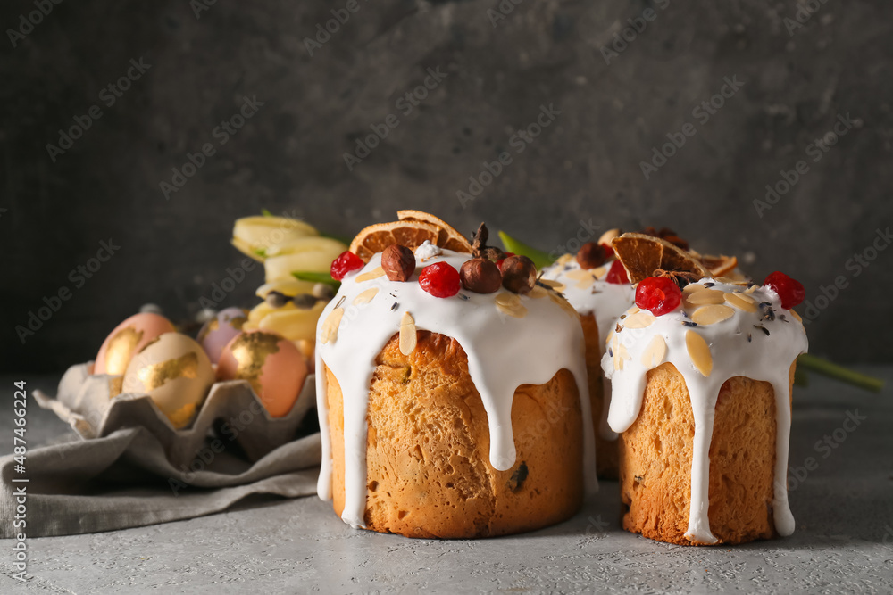 Delicious Easter cakes on table