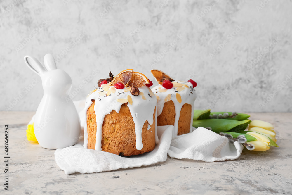 Delicious Easter cakes on light background