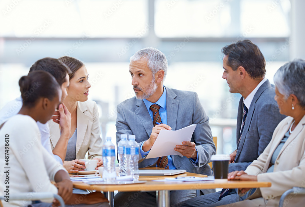 Time to put our plans into action. Shot of a group of businesspeople having a boardroom meeting.