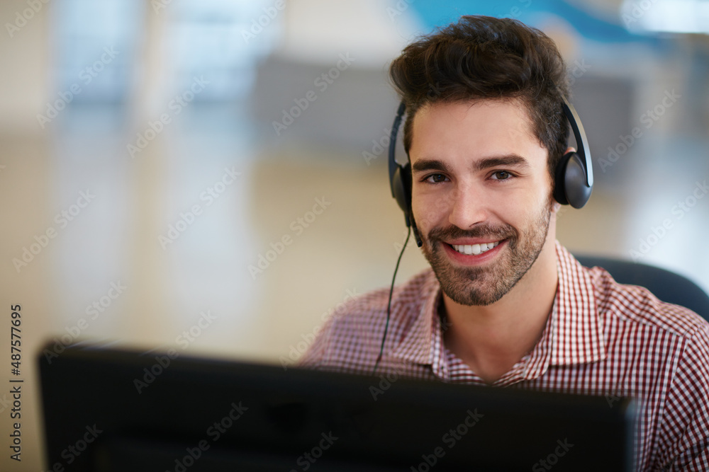 To improve your business, first improve yourself. Shot of a friendly young call centre agent sitting