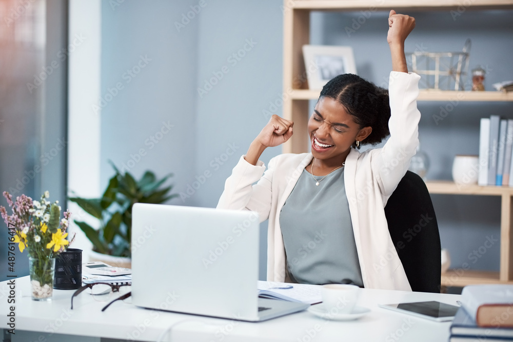 Success happens when you combine passion with ambition. Shot of a happy young businesswoman celebrat