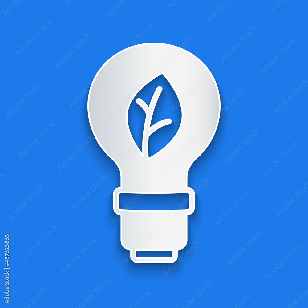 Paper cut Light bulb with leaf icon isolated on blue background. Eco energy concept. Alternative ene