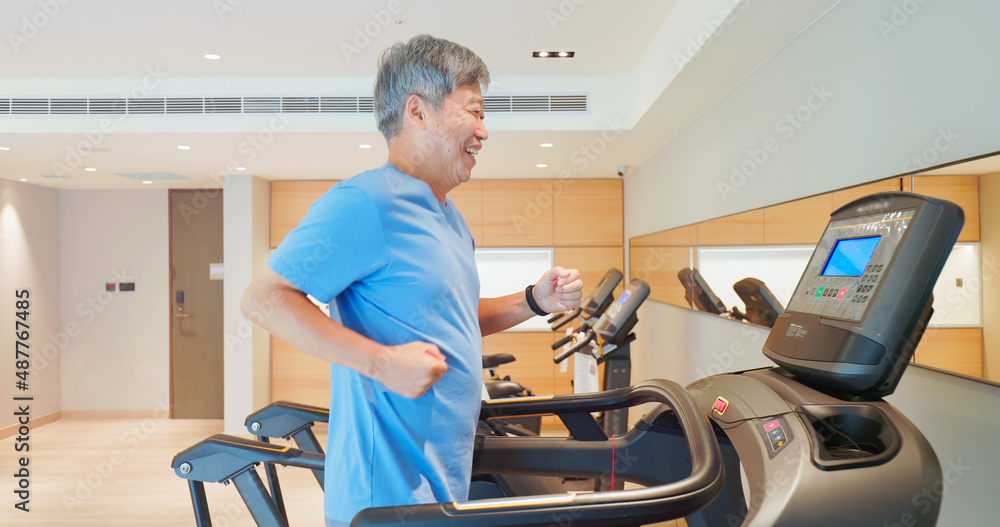 man running on treadmill