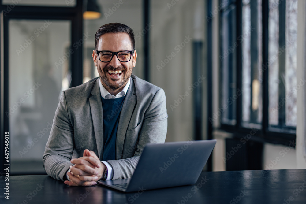 Portrait of lovely caucasian entrepeneur, enjoying the office atmosphere, working.