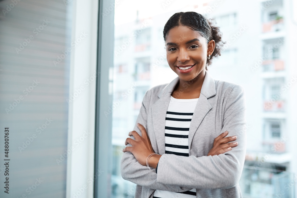 Stand firm in the face of business. Portrait of a confident young businesswoman working in a modern 