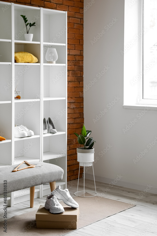 Interior of modern room with shelf unit