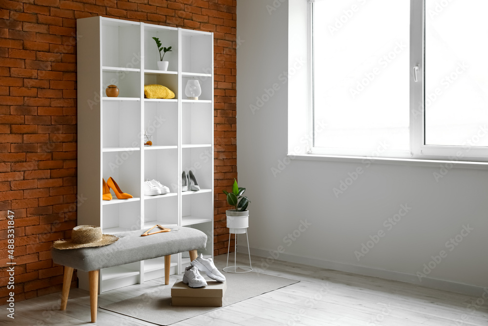 Interior of modern room with shelf unit