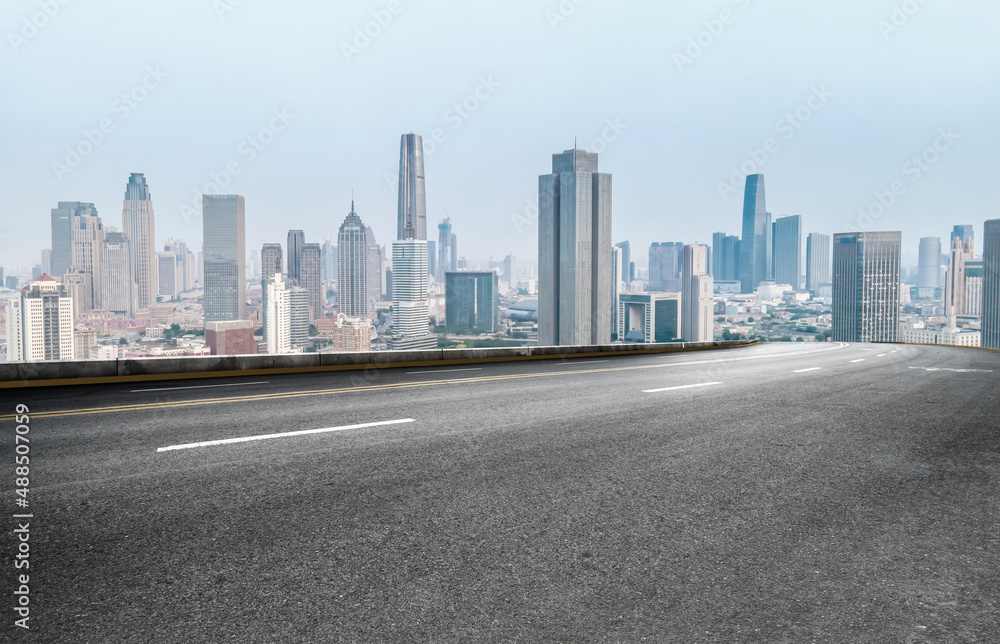 Road and Chinese modern city buildings background