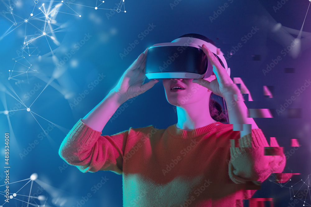 Woman with VR virtual reality goggles