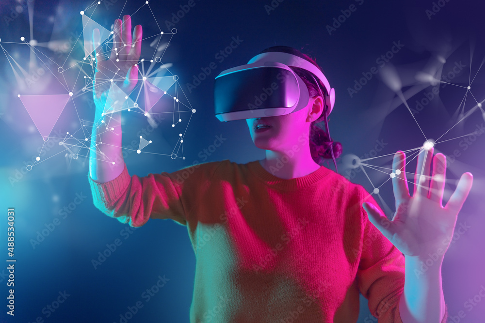 Woman with VR virtual reality goggles