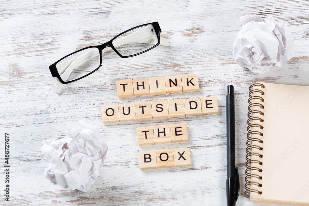 Think outside the box quote with letters