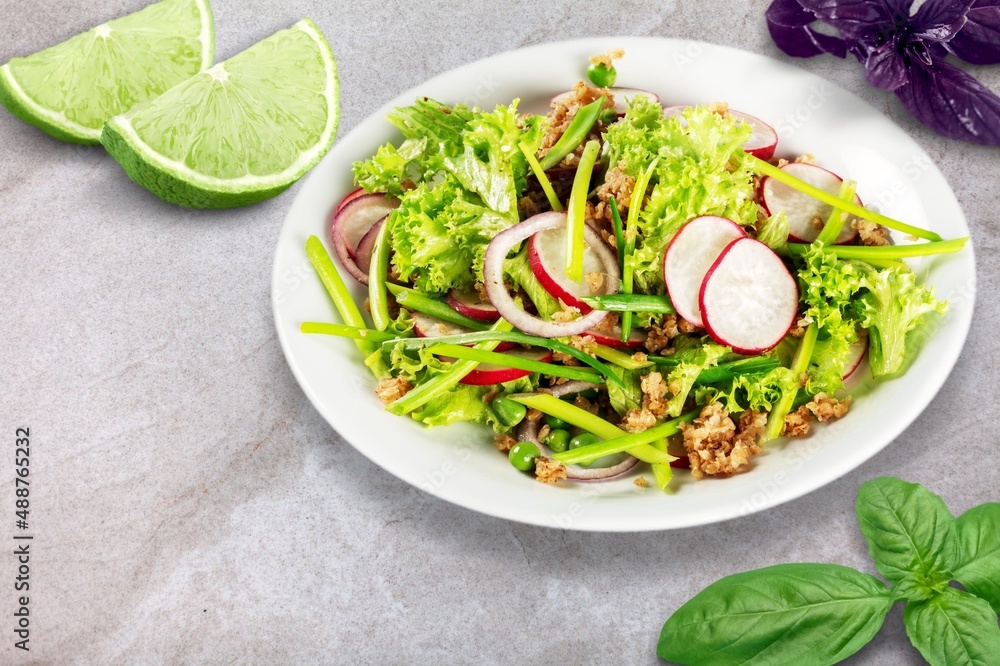 Salted tasty fresh salad with fresh green vegetables. Ketogenic, keto or paleo diet lunch bowl.