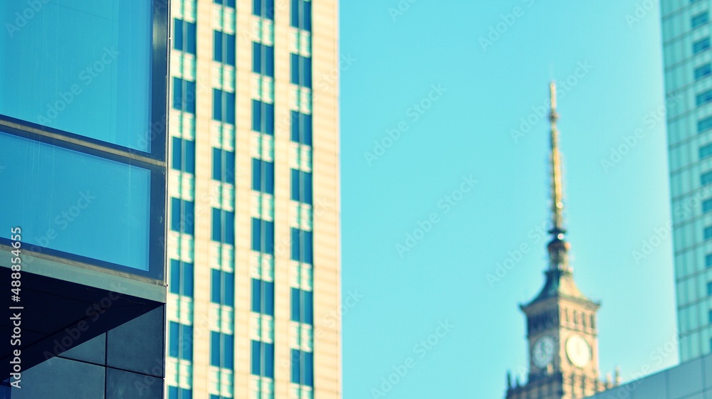 Fragments of building in business district of modern city. High-rise office building in downtown. Mo