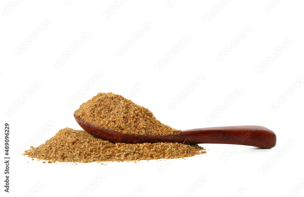 Spoon with coriander powder on white background