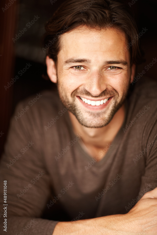 Hansome and happy with life. Portrait of a handsome young man smiling.