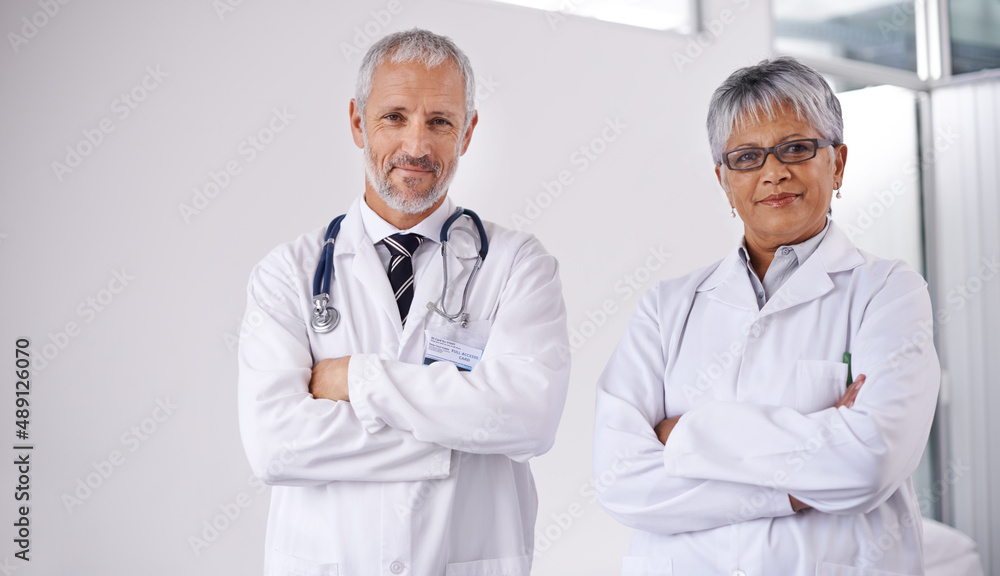 Consulting a colleague for a second opinion. Shot of two doctors working together in a hospital.