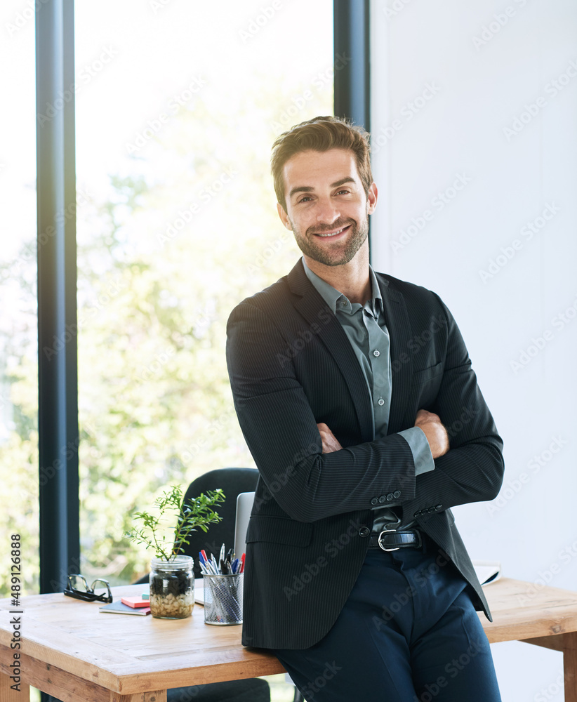 Dedicated to the job. Shot of a handsome young businessman in the office.