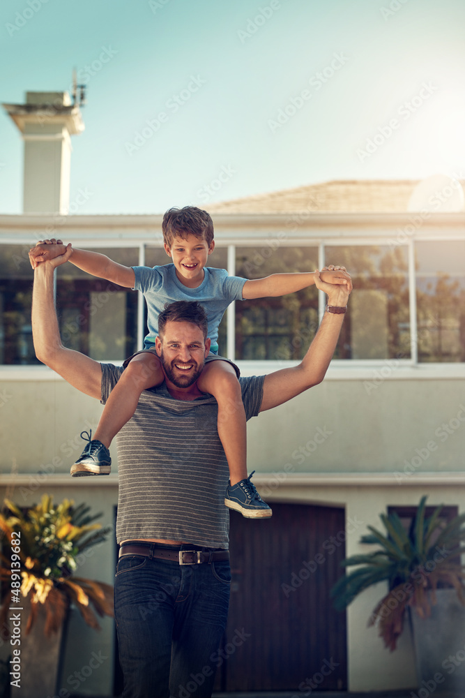 Together well take on the world. Shot of a father and son spending the day together at home.