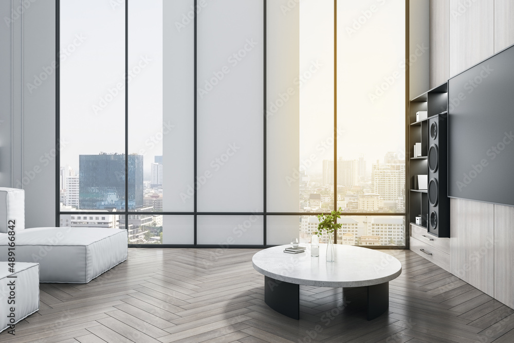 Modern living room interior with tv and stereo set, furniture and panoramic city view with daylight.