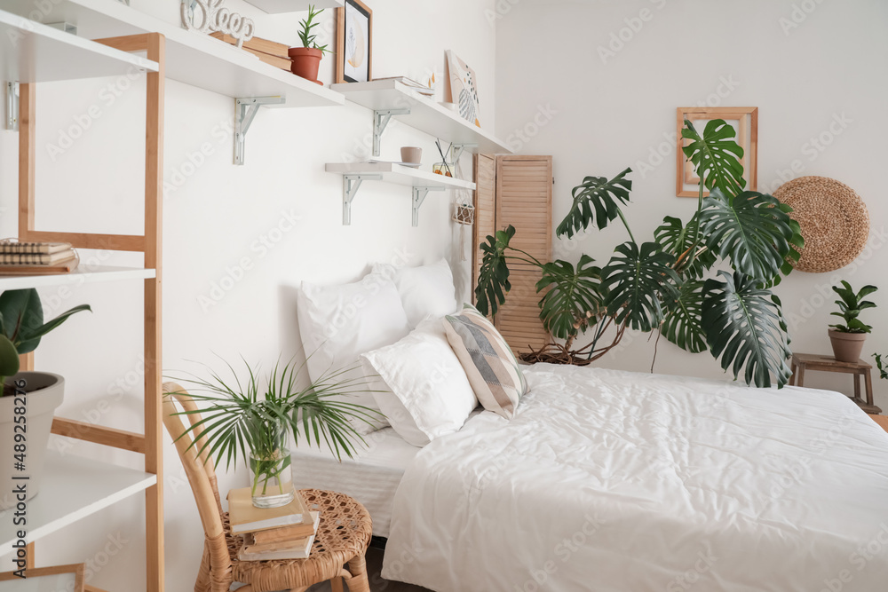 Modern interior of cozy bedroom