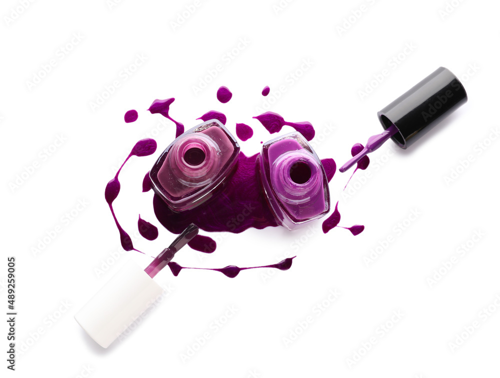 Nail polish bottles on white background