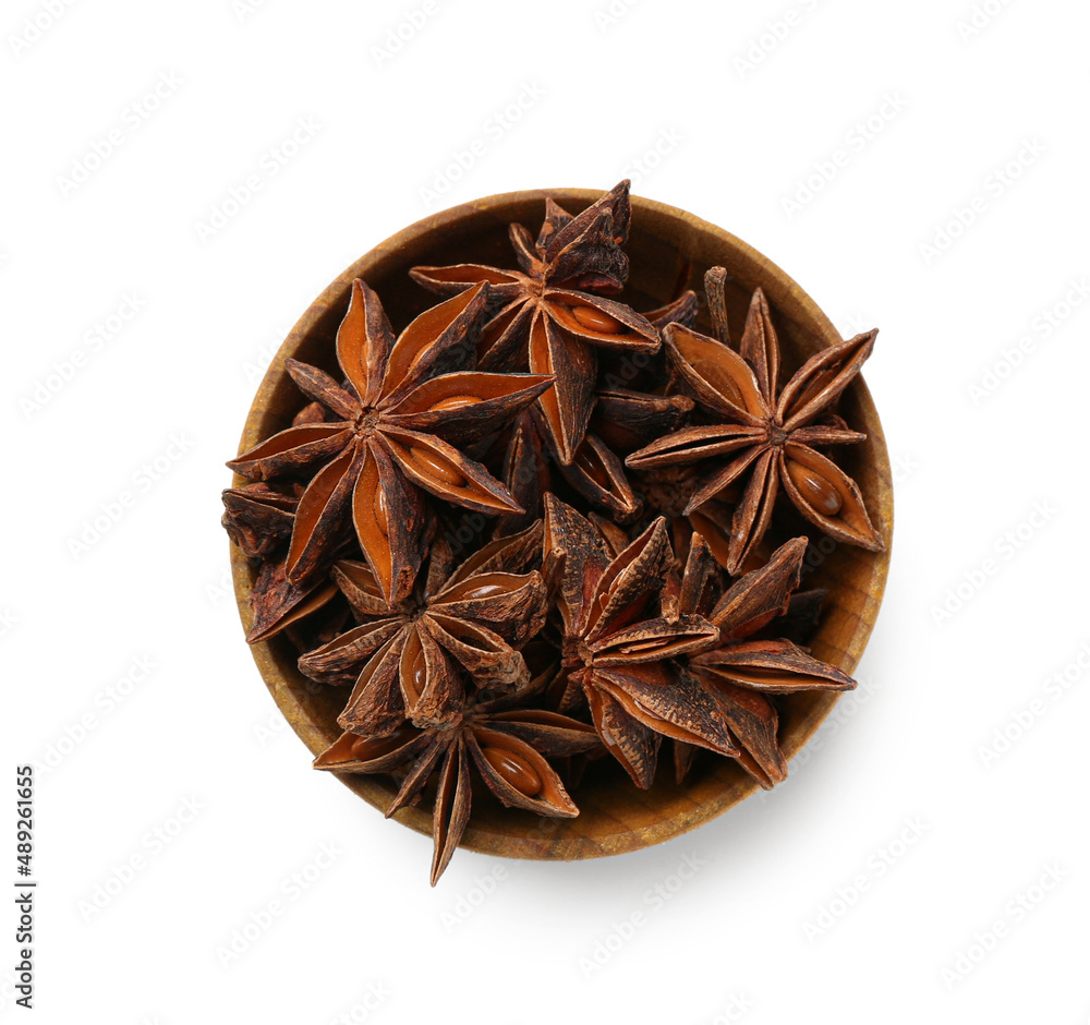 Bowl of anise stars isolated on white background