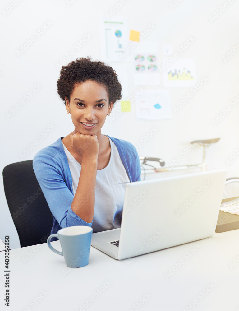 Hard work leads to success. Cropped portrait of a young architect working on her laptop.