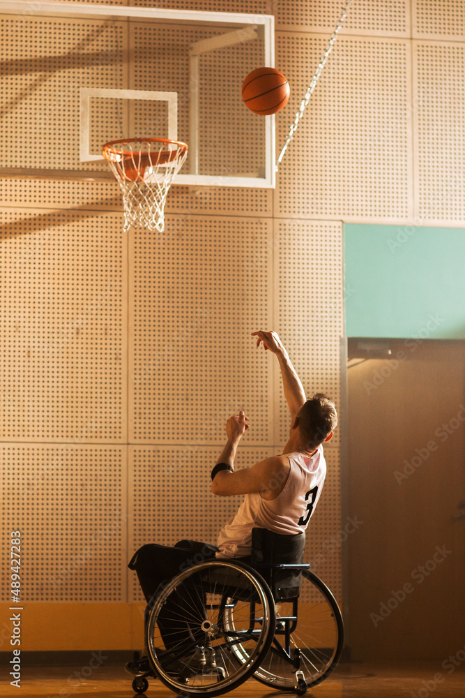 Wheelchair Basketball Player Shooting Ball to Score a Goal Like a Professional. Determination, Motiv