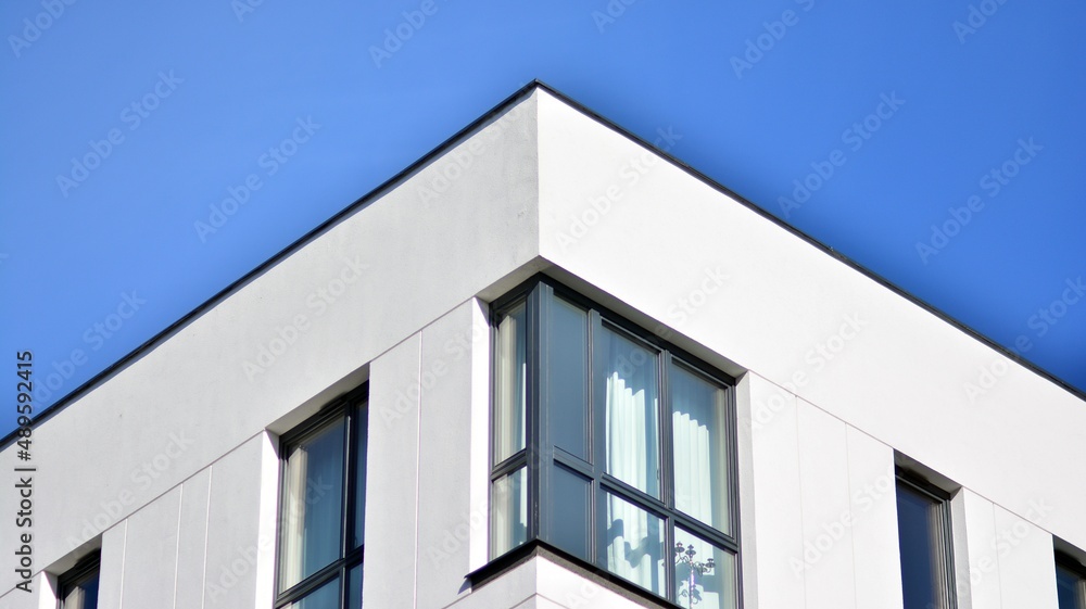 Fragment of modern residential apartment with flat buildings exterior. Detail of new luxury house an