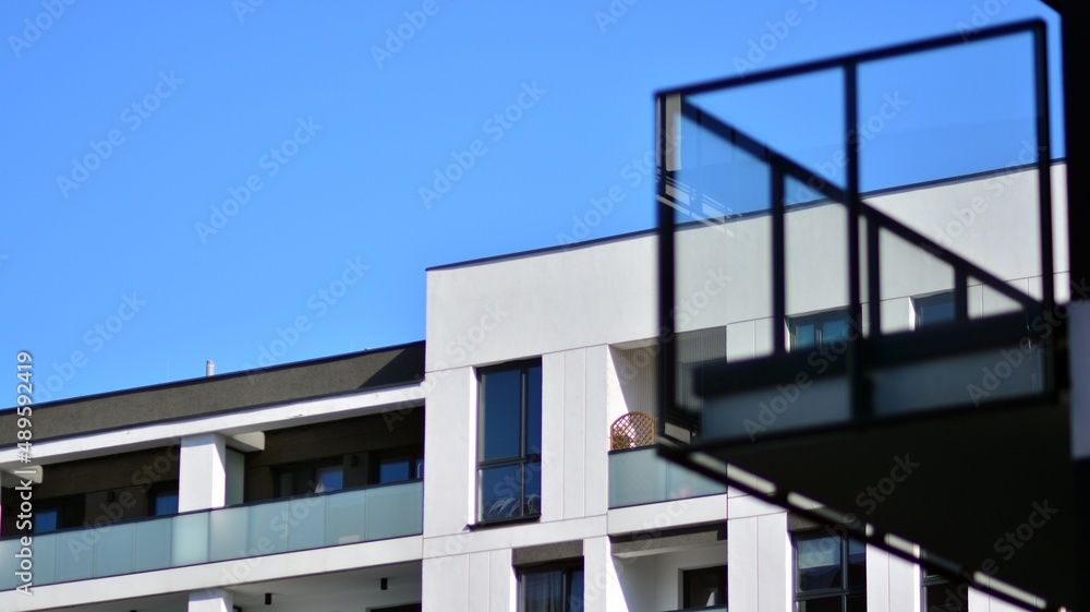 Fragment of modern residential apartment with flat buildings exterior. Detail of new luxury house an