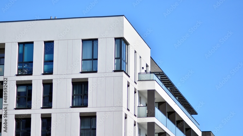 Fragment of modern residential apartment with flat buildings exterior. Detail of new luxury house an