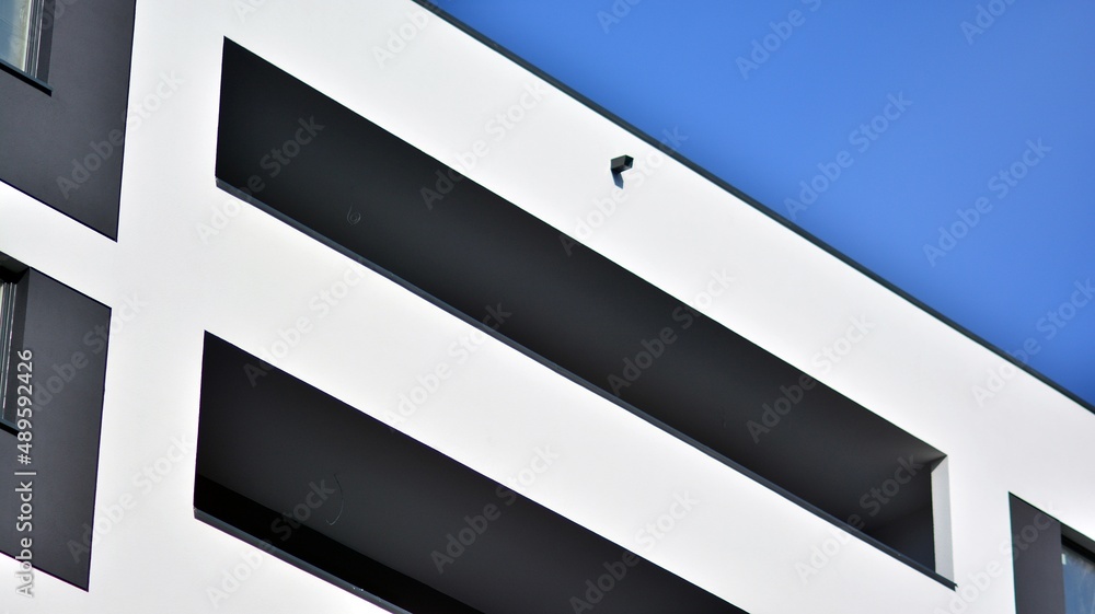 Fragment of modern residential apartment with flat buildings exterior. Detail of new luxury house an