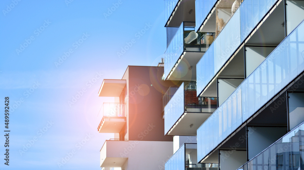 Fragment of modern residential apartment with flat buildings exterior. Detail of new luxury house an