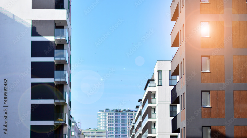 Fragment of modern residential apartment with flat buildings exterior. Detail of new luxury house an