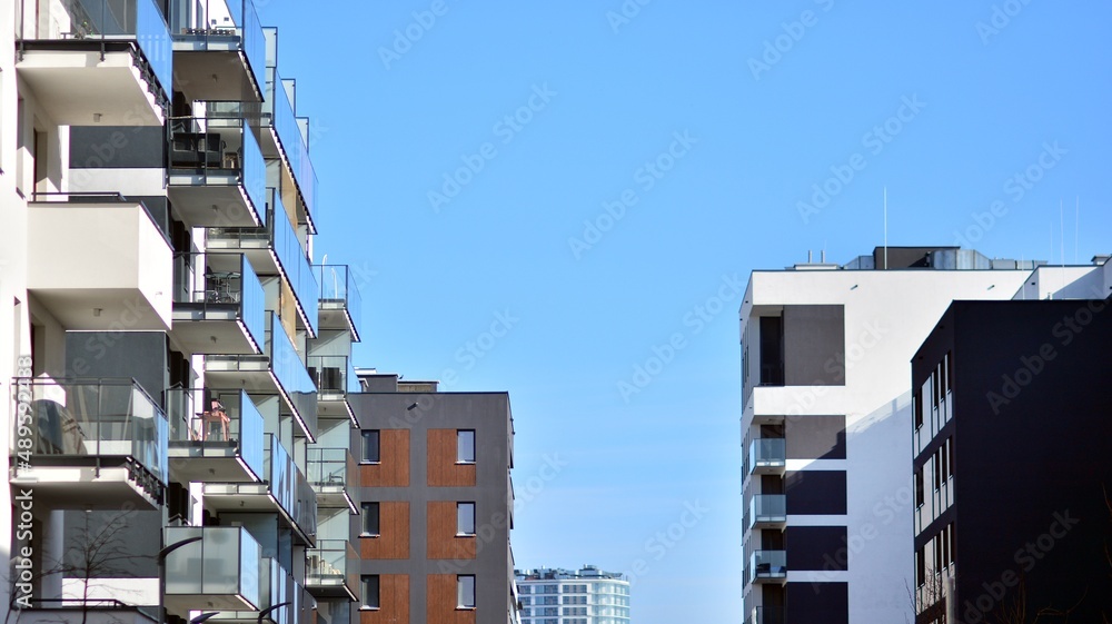 Fragment of modern residential apartment with flat buildings exterior. Detail of new luxury house an