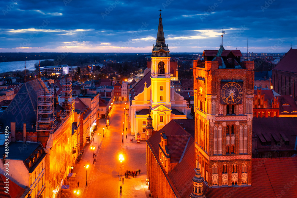 Architecture of the old town in Torun at dusk, Poland.