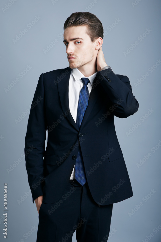 Slick and stylish. Cropped shot of a handsome and fashionable young man posing in the studio.