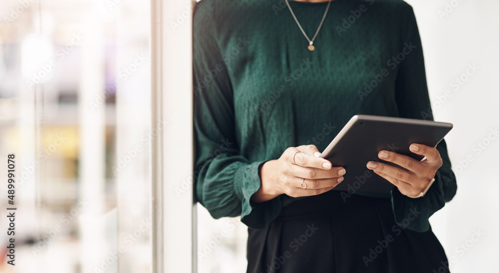 Business in the world of technology. Cropped portrait of an unrecognizable young businesswoman using