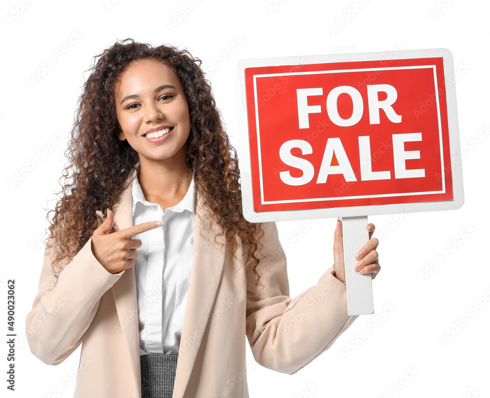 African-American real estate agent with For Sale