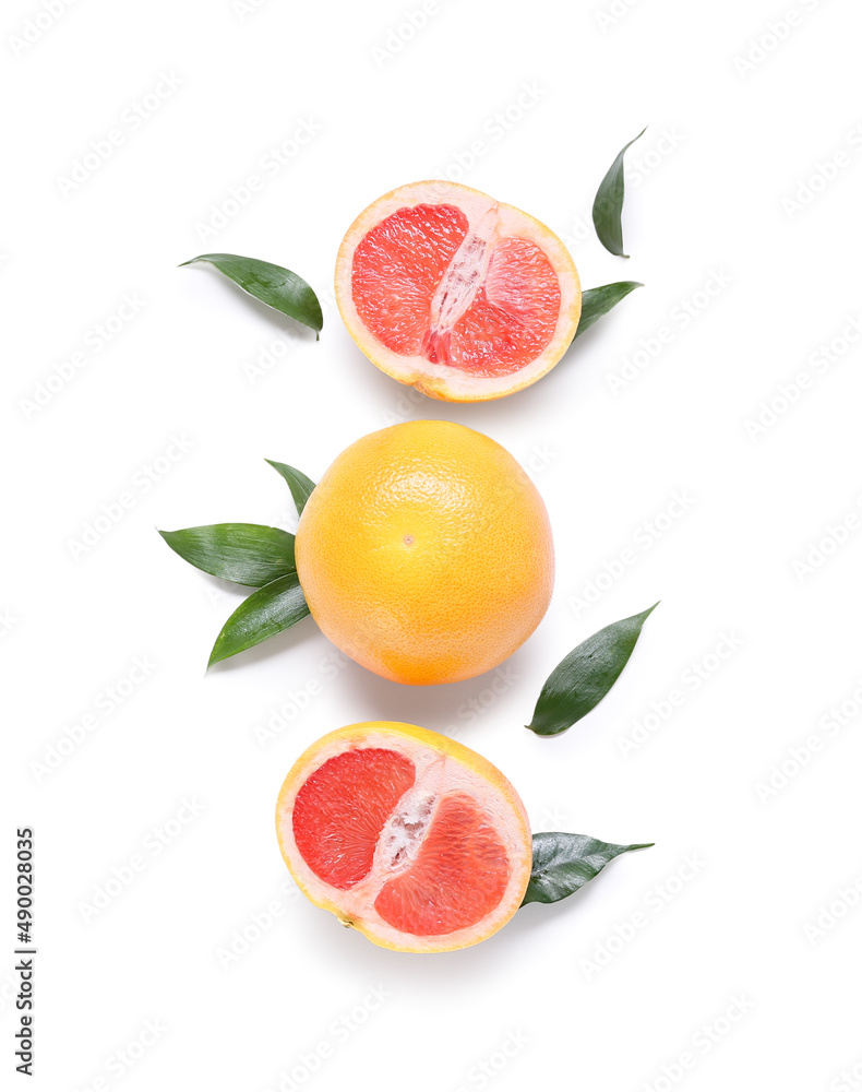 Delicious grapefruits on white background