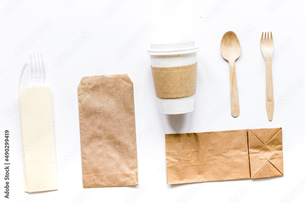 paper bags and plastic cup for take away set top view space for text