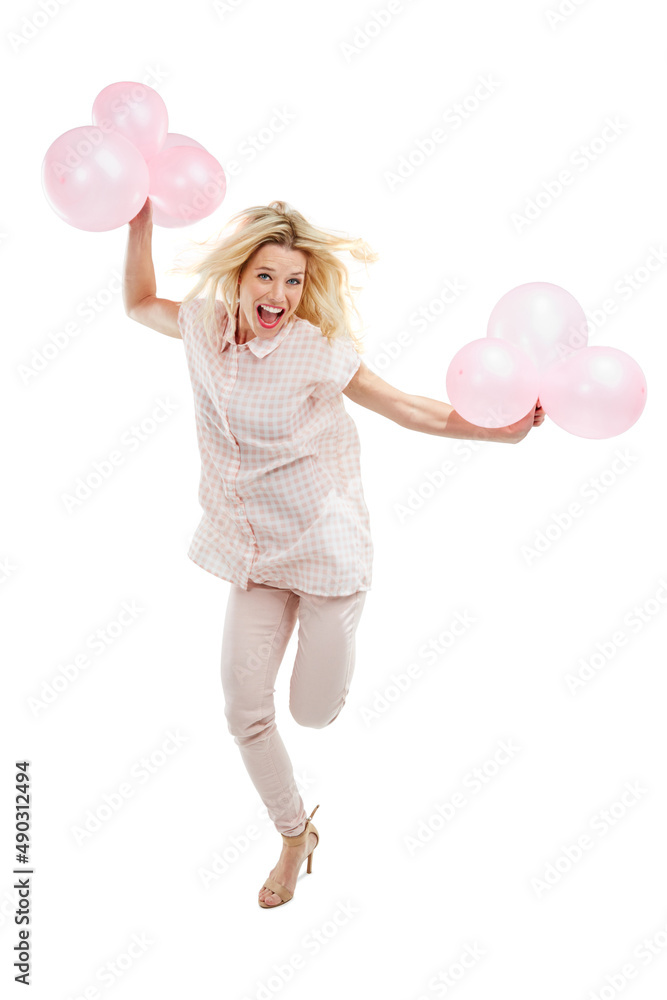 She puts the happy in happy birthday. Studio portrait of an excited young woman celebrating with pin