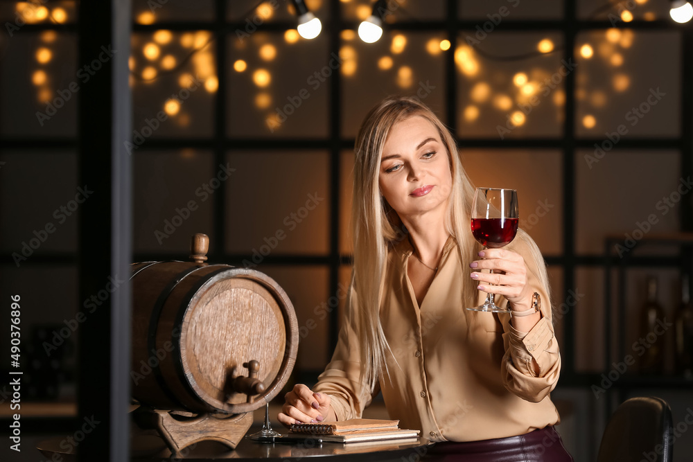 Female sommelier tasting types of wine