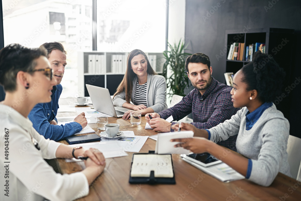 Utilizing the knowledge, experience and skills of everyone involved. Shot of a group of businesspeop