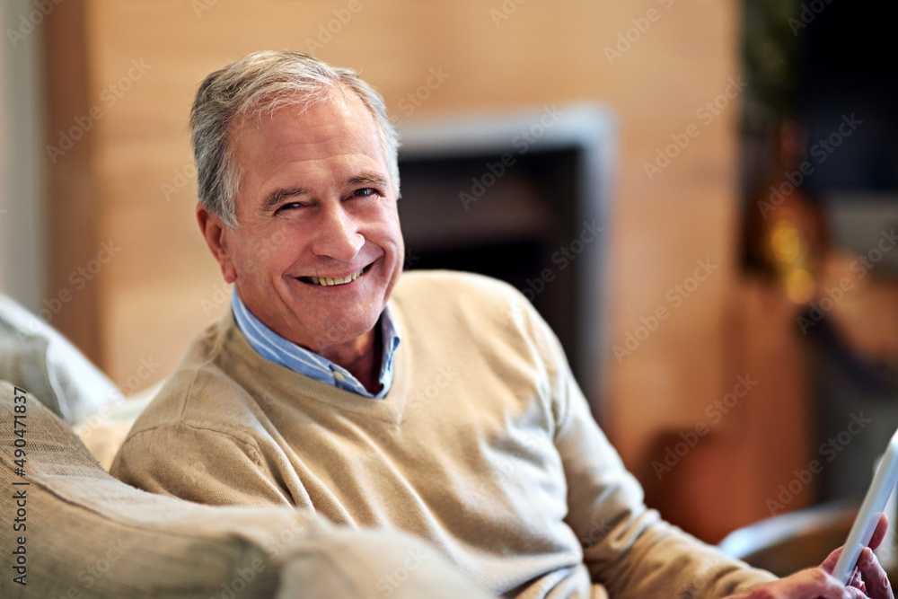 Now I have more of that Me time. Shot of a senior man relaxing at home.