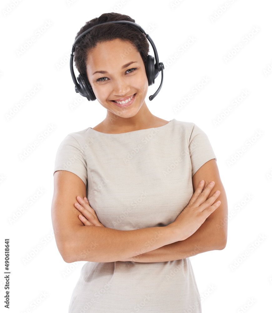 Her voice projects friendliness. Studio portrait of an attractive young woman talking on a headset i