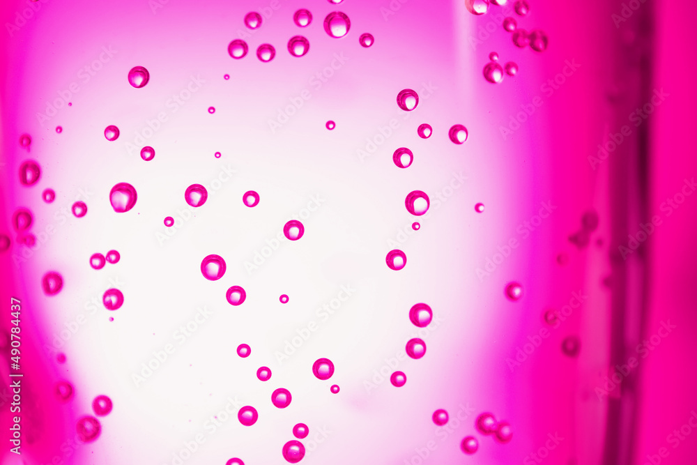 Glass of clear water with bubbles on color background, closeup